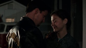 Movie still from “Ruby in Paradise” (1993), directed by Victor Nunez – A man and a woman looking at one another; Close Up shot, Over the shoulder angle