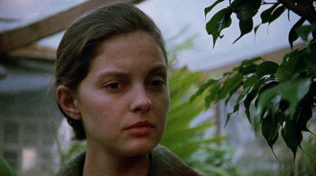 Movie still from “Ruby in Paradise” (1993), directed by Victor Nunez – A young woman is looking into the distance; Close Up shot, Low angle