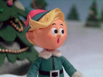 Movie still from “Rudolph the Red-Nosed Reindeer” (1964), directed by Larry Roemer – The head of a christmas elf doll; Close Up shot, Low angle