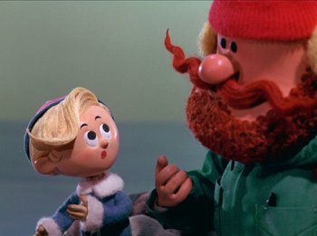 Movie still from “Rudolph the Red-Nosed Reindeer” (1964), directed by Larry Roemer – A doll and a stuffed animal; Close Up shot, Low angle