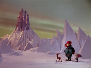 Movie still from “Rudolph the Red-Nosed Reindeer” (1964), directed by Larry Roemer – A lot of snow on the ground; Extreme Wide shot, High angle