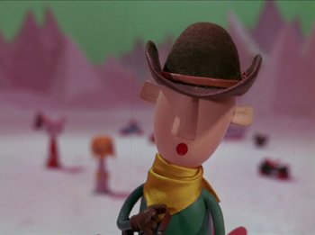 Movie still from “Rudolph the Red-Nosed Reindeer” (1964), directed by Larry Roemer – A cartoon character with a hat; Close Up shot, Low angle