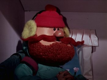 Movie still from “Rudolph the Red-Nosed Reindeer” (1964), directed by Larry Roemer – The head of a stuffed doll; Close Up shot, Low angle