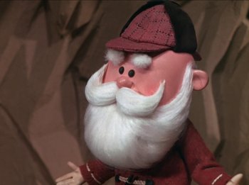 Movie still from “Rudolph the Red-Nosed Reindeer” (1964), directed by Larry Roemer – The head of a cartoon character; Close Up shot, Low angle