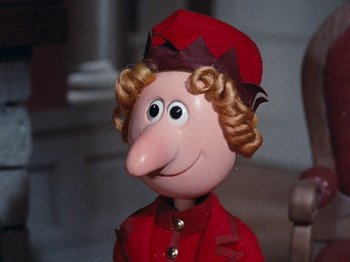 Movie still from “Rudolph's Shiny New Year” (1976), directed by Jules Bass – The nose of a doll; Close Up shot, Over the shoulder angle