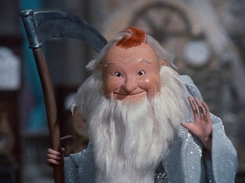 Movie still from “Rudolph's Shiny New Year” (1976), directed by Jules Bass – The face of a wizard doll; Close Up shot, Low angle