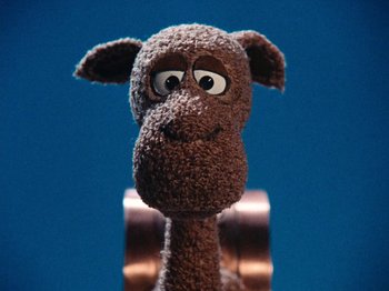 Movie still from “Rudolph's Shiny New Year” (1976), directed by Jules Bass – A stuffed animal with eyes and a nose; Close Up shot, Low angle