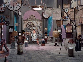 Movie still from “Rudolph's Shiny New Year” (1976), directed by Jules Bass – A room filled with lots of different clocks; Extreme Wide shot, High angle