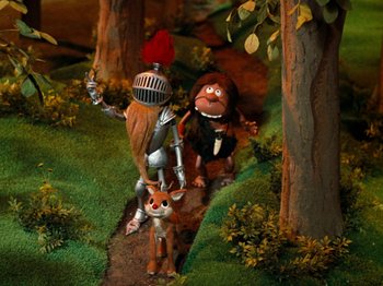 Movie still from “Rudolph's Shiny New Year” (1976), directed by Jules Bass – A scene with a knight , a squirrel , and an animal in the woods; Wide shot, High angle