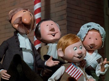 Movie still from “Rudolph's Shiny New Year” (1976), directed by Jules Bass – A group of puppets; Medium shot, Low angle