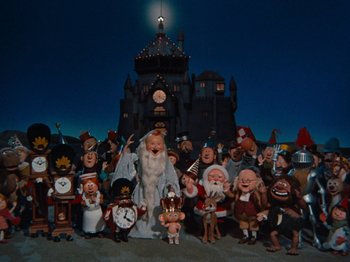 Movie still from “Rudolph's Shiny New Year” (1976), directed by Jules Bass – A group of people that are posing for a picture; Extreme Wide shot, Low angle