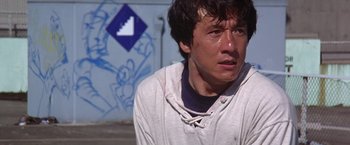 Movie still from “Rumble in the Bronx” (1995), directed by Stanley Tong – A young man with his face covered in blood; Close Up shot, Low angle