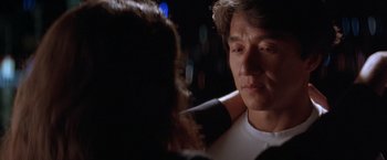 Movie still from “Rumble in the Bronx” (1995), directed by Stanley Tong – A person talking to another person; Close Up shot, Over the shoulder angle