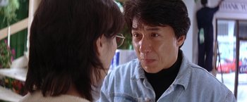 Movie still from “Rumble in the Bronx” (1995), directed by Stanley Tong – A man and a woman looking at each other; Close Up shot, Over the shoulder angle