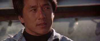 Movie still from “Rumble in the Bronx” (1995), directed by Stanley Tong – A person wearing a jacket; Close Up shot, Low angle