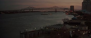Movie still from “Runaway Jury” (2003), directed by Gary Fleder – A large body of water with a bridge in the background; Extreme Wide shot, High angle