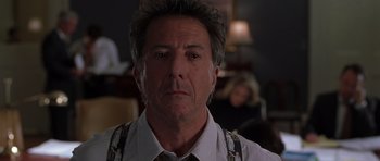 Movie still from “Runaway Jury” (2003), directed by Gary Fleder – A person wearing a shirt and tie; Close Up shot, Over the shoulder angle