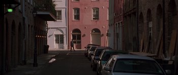 Movie still from “Runaway Jury” (2003), directed by Gary Fleder – Cars parked on the side of the street near a building; Extreme Wide shot, High angle