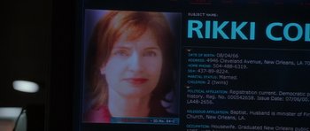 Movie still from “Runaway Jury” (2003), directed by Gary Fleder – A person's face on a computer screen; Extreme Close Up shot, Low angle