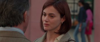 Movie still from “Runaway Jury” (2003), directed by Gary Fleder – A person wearing a jacket; Close Up shot, Over the shoulder angle
