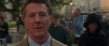 Movie still from “Runaway Jury” (2003), directed by Gary Fleder – A person wearing a jacket; Close Up shot, Over the shoulder angle