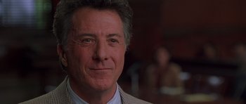 Movie still from “Runaway Jury” (2003), directed by Gary Fleder – A person wearing a jacket; Close Up shot, Over the shoulder angle