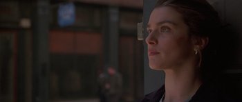 Movie still from “Runaway Jury” (2003), directed by Gary Fleder – A person looking up at something; Close Up shot, Low angle