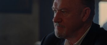 Movie still from “Runaway Jury” (2003), directed by Gary Fleder – An older man with a goatee and a beard; Close Up shot, Low angle