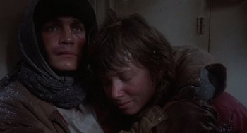 Movie still from “Runaway Train” (1985), directed by Andrey Konchalovskiy – A man and a woman sleeping next to each other; Close Up shot, Low angle