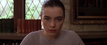 Movie still from “Rushmore” (1998), directed by Wes Anderson – A person wearing a sweater; Close Up shot, Low angle