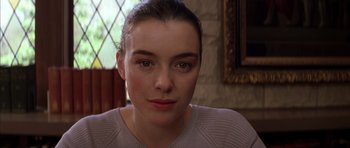 Movie still from “Rushmore” (1998), directed by Wes Anderson – A woman's face in front of a window; Close Up shot, Low angle