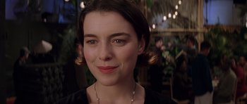 Movie still from “Rushmore” (1998), directed by Wes Anderson – A person wearing a black shirt; Close Up shot, Over the shoulder angle