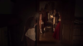 Movie still from “Russian Ark” (2002), directed by Aleksandr Sokurov – A group of people dressed in period clothing; Wide shot, High angle