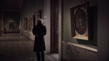 Movie still from “Russian Ark” (2002), directed by Aleksandr Sokurov – An old man standing in front of a painting; Medium shot, Over the shoulder angle
