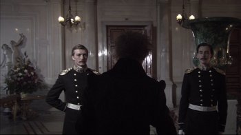 Movie still from “Russian Ark” (2002), directed by Aleksandr Sokurov – A man in a military uniform standing in front of another man; Medium shot, Over the shoulder angle