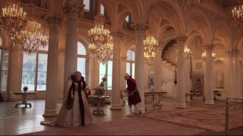 Movie still from “Russian Ark” (2002), directed by Aleksandr Sokurov – A group of people standing inside of a room; Extreme Wide shot, High angle