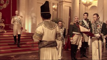 Movie still from “Russian Ark” (2002), directed by Aleksandr Sokurov – A group of men standing next to each other in a room; Wide shot, Over the shoulder angle