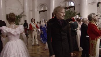 Movie still from “Russian Ark” (2002), directed by Aleksandr Sokurov – A group of people dressed up in costumes in a room; Medium shot, Over the shoulder angle