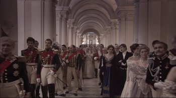 Movie still from “Russian Ark” (2002), directed by Aleksandr Sokurov – A group of people dressed in formal attire; Wide shot, High angle