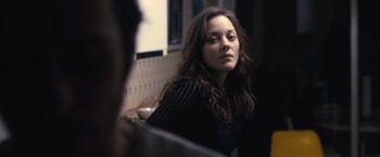 Movie still from “Rust and Bone” (2012), directed by Jacques Audiard – A woman is looking at herself in the mirror; Close Up shot, Over the shoulder angle