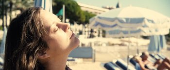 Movie still from “Rust and Bone” (2012), directed by Jacques Audiard – A person with their eyes closed; Close Up shot, Low angle