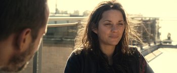 Movie still from “Rust and Bone” (2012), directed by Jacques Audiard – A person with long brown hair; Close Up shot, Low angle