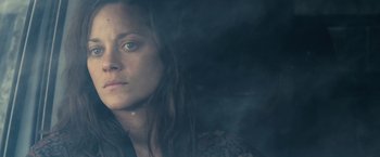 Movie still from “Rust and Bone” (2012), directed by Jacques Audiard – A person with long brown hair; Close Up shot, Low angle