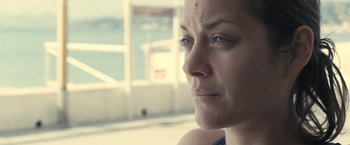Movie still from “Rust and Bone” (2012), directed by Jacques Audiard – A person with blue eyes; Close Up shot, Over the shoulder angle