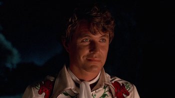 Movie still from “Rustlers' Rhapsody” (1985), directed by Hugh Wilson – A person wearing a shirt and tie; Close Up shot, Low angle