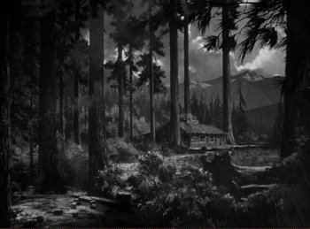 Movie still from “Saboteur” (1942), directed by Alfred Hitchcock – Black and white painting of a cabin in the woods; Extreme Wide shot, High angle