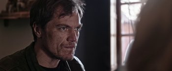 Movie still from “Salt and Fire” (2016), directed by Werner Herzog – A person wearing a leather jacket; Close Up shot, Low angle
