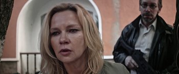 Movie still from “Salt and Fire” (2016), directed by Werner Herzog – A person with long blonde hair; Close Up shot, Over the shoulder angle