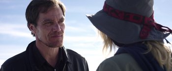 Movie still from “Salt and Fire” (2016), directed by Werner Herzog – A man and a woman talking to each other outside; Close Up shot, Over the shoulder angle