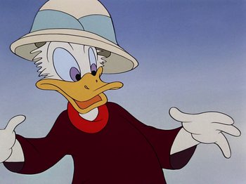 Movie still from “Saludos Amigos” (1942), directed by Jack Kinney – A cartoon duck wearing a hat; Close Up shot, Over the shoulder angle